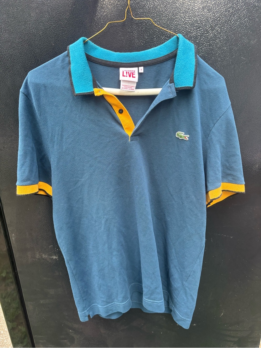 Lacoste L!VE Blue Polo with Yellow Trim and Teal Collar